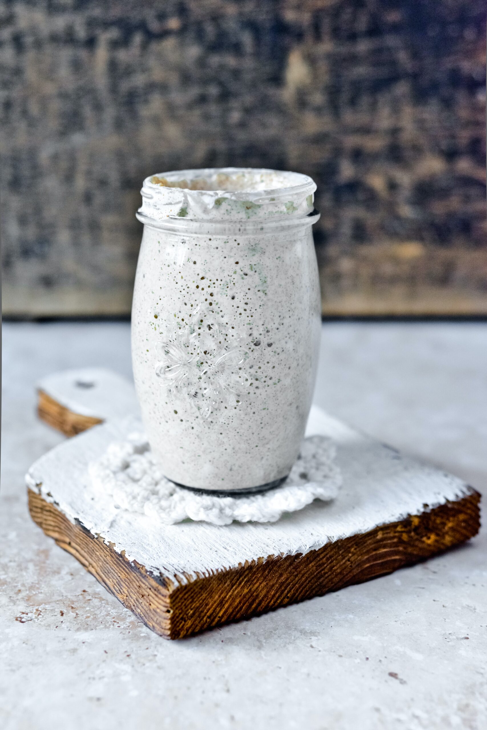 A picture a sourdough starer on a board